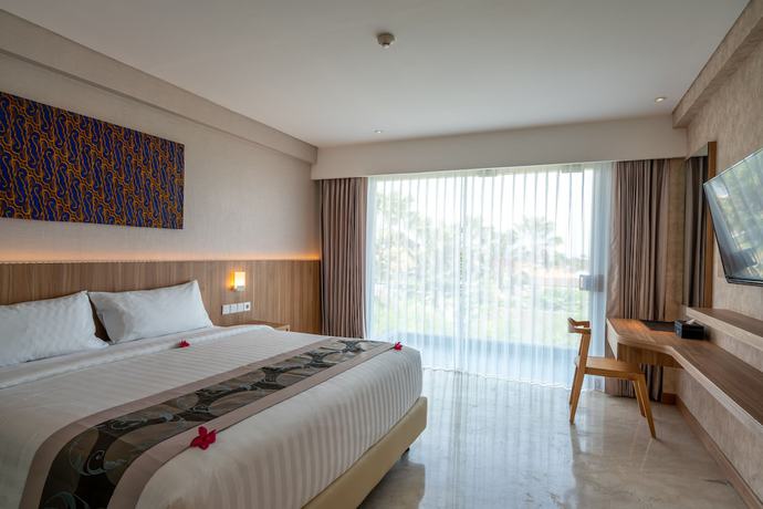 Imagen de la habitación del Hotel The Capital Hotel and Resort Seminyak. Foto 15
