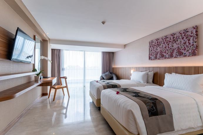 Imagen de la habitación del Hotel The Capital Hotel and Resort Seminyak. Foto 17