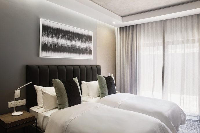 Imagen de la habitación del Hotel The Capital Melrose. Foto 2