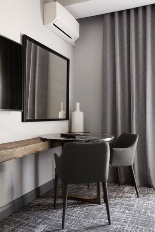 Imagen de la habitación del Hotel The Capital Melrose. Foto 3