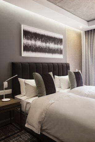 Imagen de la habitación del Hotel The Capital Melrose. Foto 7