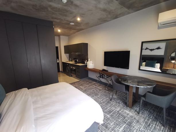 Imagen de la habitación del Hotel The Capital Melrose. Foto 10