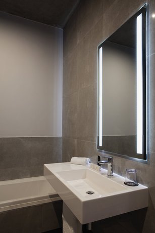 Imagen de la habitación del Hotel The Capital Melrose. Foto 13