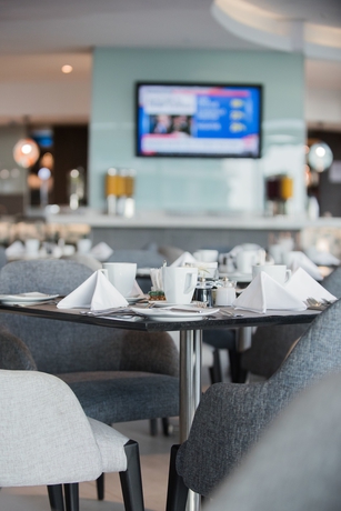 Imagen del bar/restaurante del Hotel The Capital Pearls. Foto 5