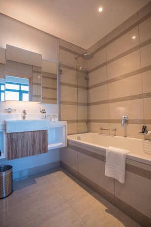 Imagen de la habitación del Hotel The Capital Pearls. Foto 12