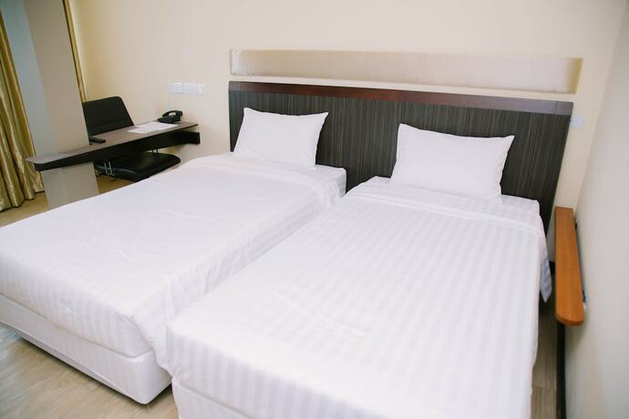 Imagen de la habitación del Hotel The Capital Residence Suites. Foto 13