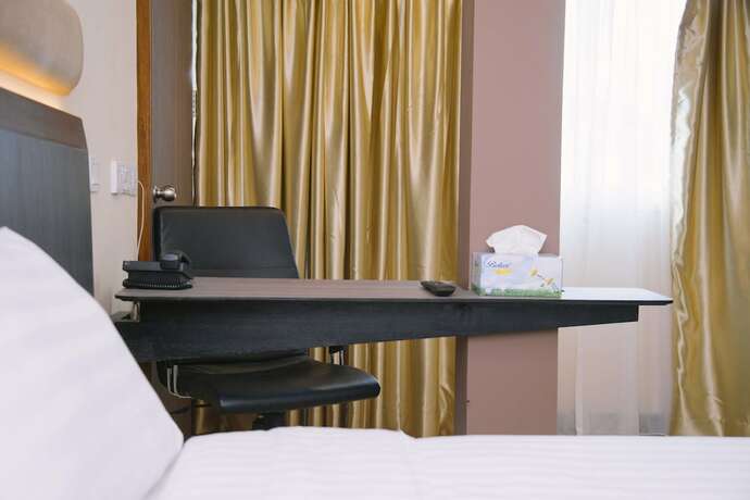 Imagen de la habitación del Hotel The Capital Residence Suites. Foto 15