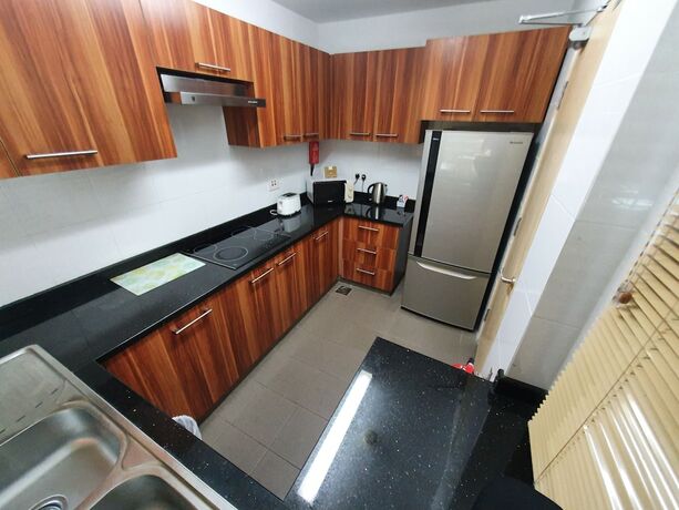 Imagen de la habitación del Hotel The Capital Residence Suites. Foto 18