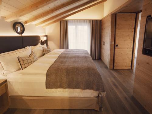 Imagen de la habitación del Hotel The Capra Saas-fee. Foto 7