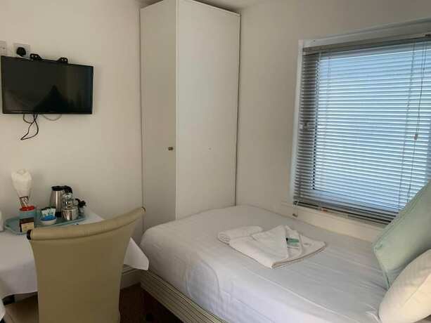 Imagen de la habitación del Hotel The Cardigan Bay Guest House. Foto 12