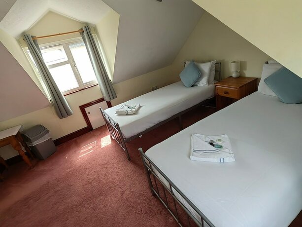 Imagen de la habitación del Hotel The Cardigan Bay Guest House. Foto 13