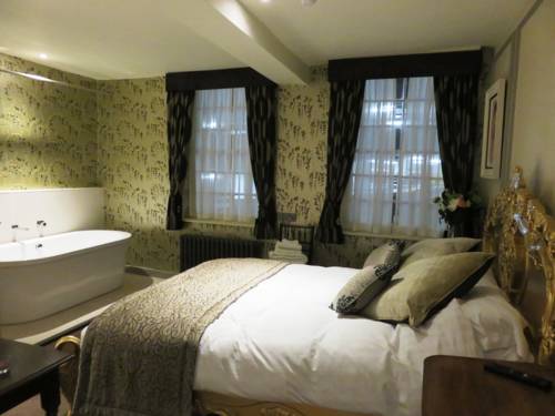 Imagen de la habitación del Hotel The Cardinals Hat. Foto 4