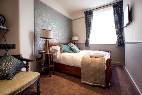 Imagen de la habitación del Hotel The Cardinals Hat. Foto 8