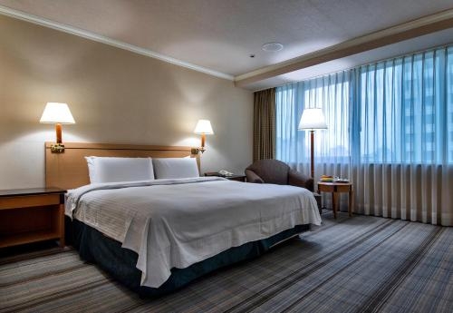 Imagen de la habitación del Hotel The Carlton - Bei Da. Foto 6