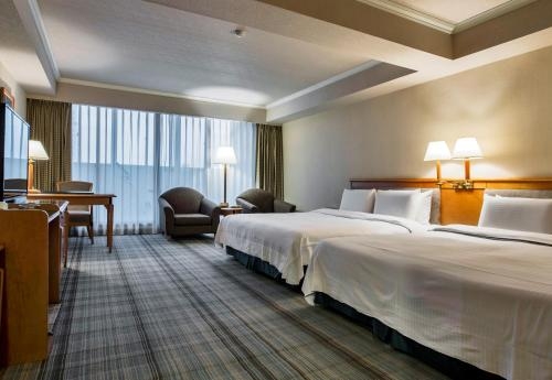 Imagen de la habitación del Hotel The Carlton - Bei Da. Foto 7