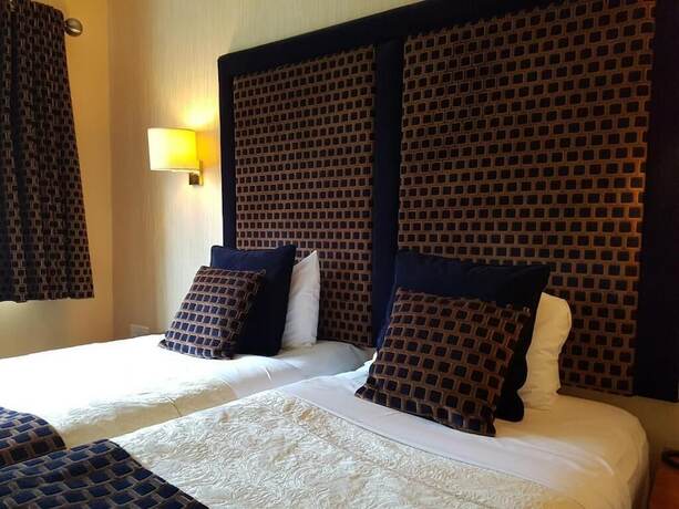 Imagen de la habitación del Hotel The Carlton Park. Foto 15