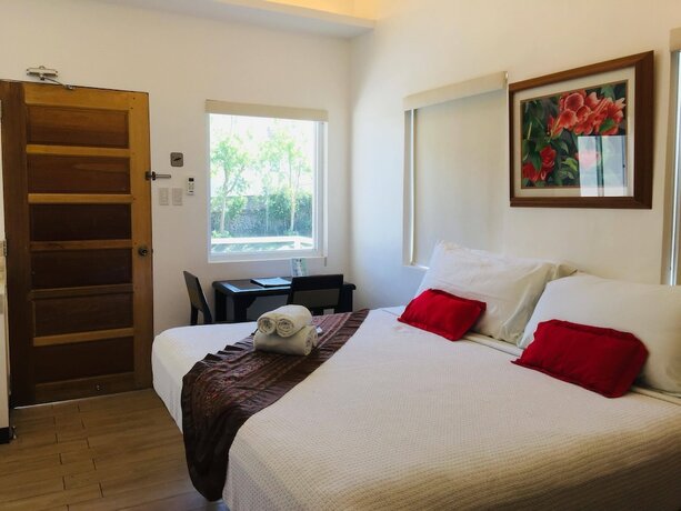 Imagen de la habitación del Hotel The Carmelence Lodge. Foto 8