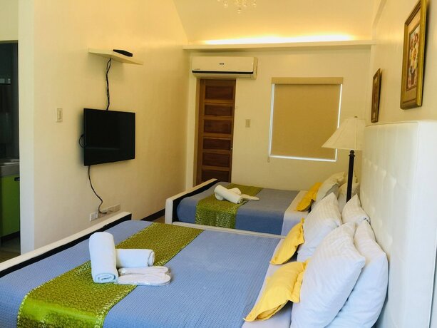 Imagen de la habitación del Hotel The Carmelence Lodge. Foto 13