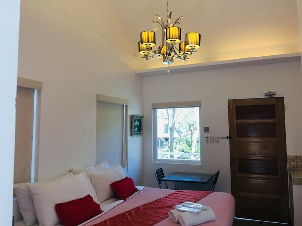 Imagen de la habitación del Hotel The Carmelence Lodge. Foto 14