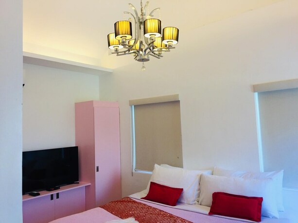 Imagen de la habitación del Hotel The Carmelence Lodge. Foto 19