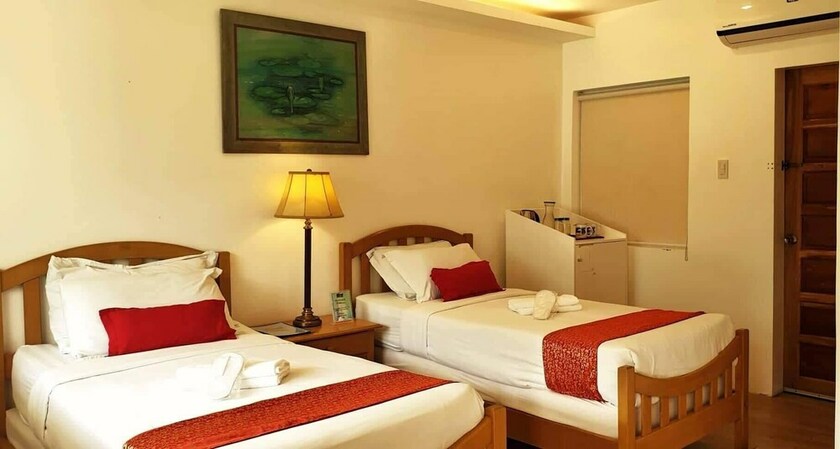 Imagen de la habitación del Hotel The Carmelence Lodge. Foto 20