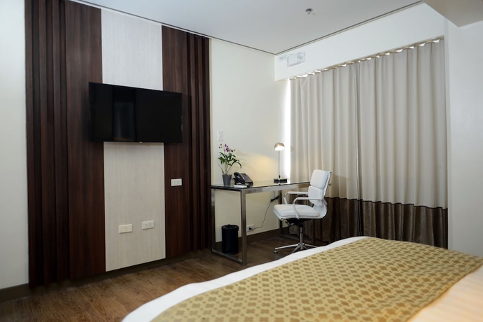 Imagen de la habitación del Hotel The Carmen Hotel. Foto 8