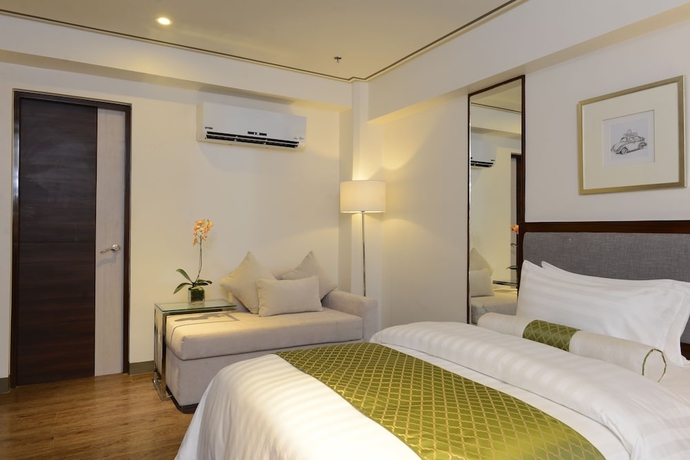Imagen de la habitación del Hotel The Carmen Hotel. Foto 13