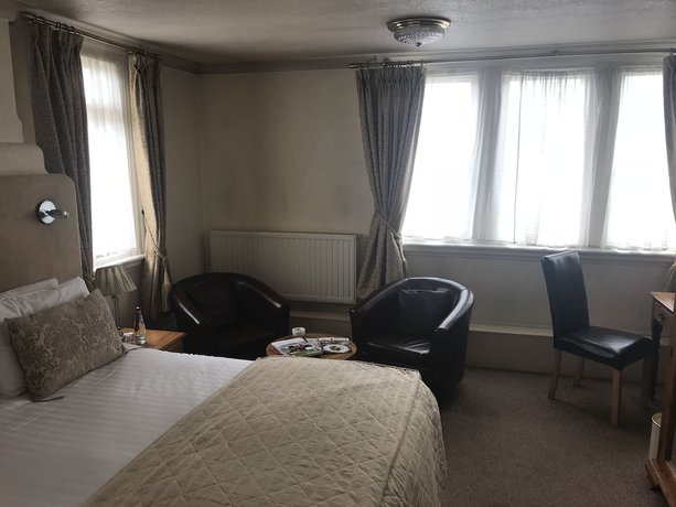 Imagen de la habitación del Hotel The Carre Arms. Foto 8