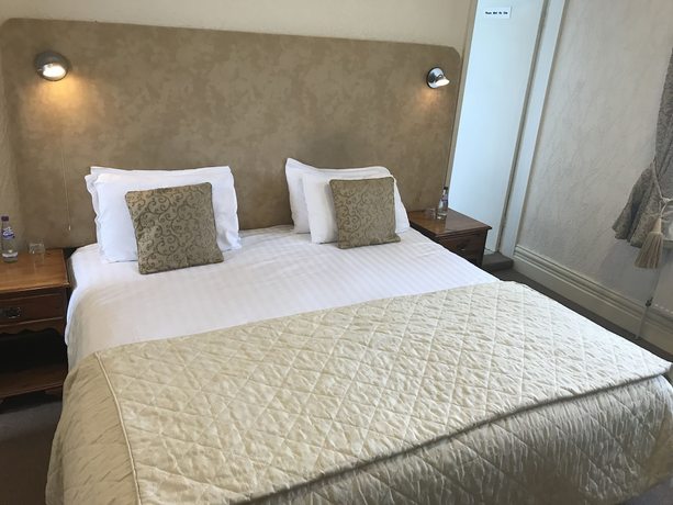 Imagen de la habitación del Hotel The Carre Arms. Foto 9