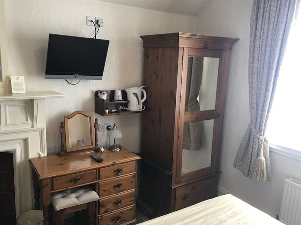 Imagen de la habitación del Hotel The Carre Arms. Foto 13