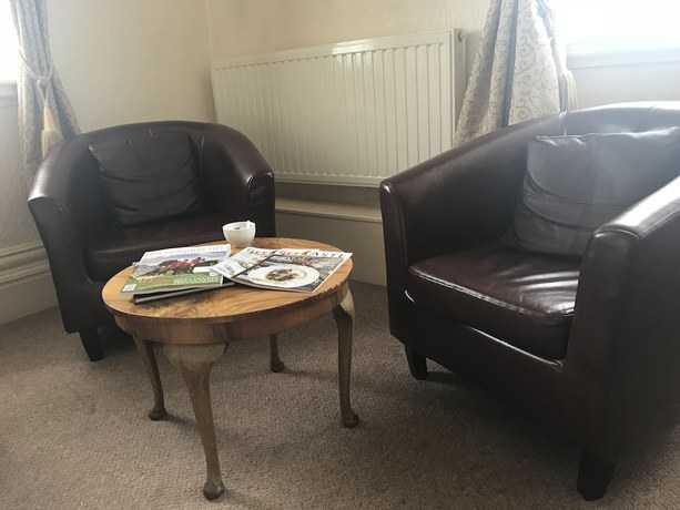 Imagen de la habitación del Hotel The Carre Arms. Foto 14