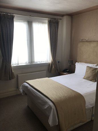 Imagen de la habitación del Hotel The Carre Arms. Foto 17