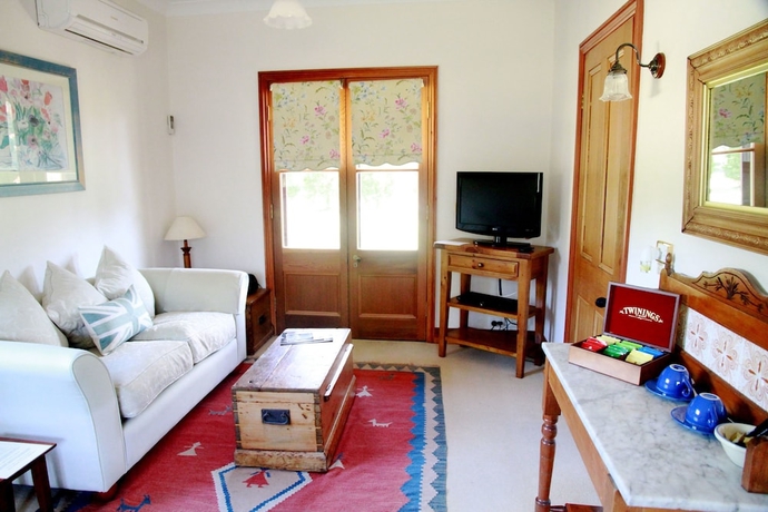 Imagen de la habitación del Hotel The Carriages. Foto 9