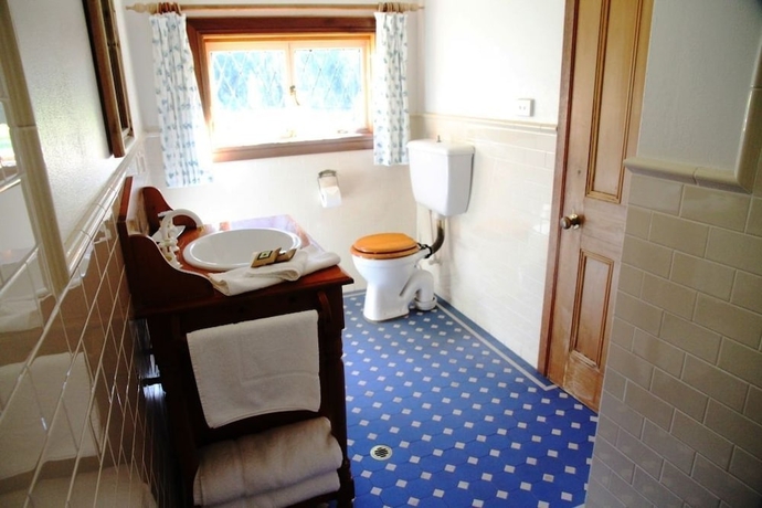 Imagen de la habitación del Hotel The Carriages. Foto 15