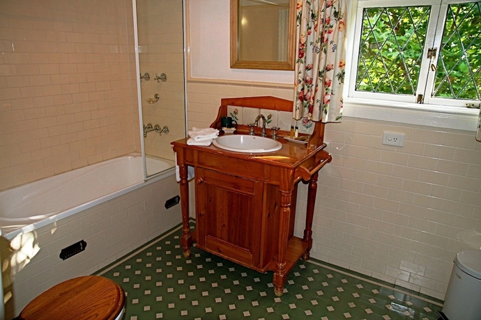 Imagen de la habitación del Hotel The Carriages. Foto 16