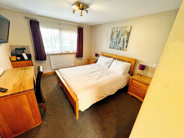 Imagen de la habitación del Hotel The Carrington Arms. Foto 17