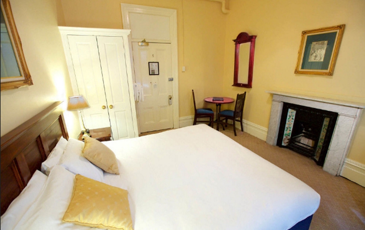 Imagen de la habitación del Hotel The Carrington. Foto 8