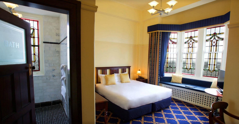 Imagen de la habitación del Hotel The Carrington. Foto 9