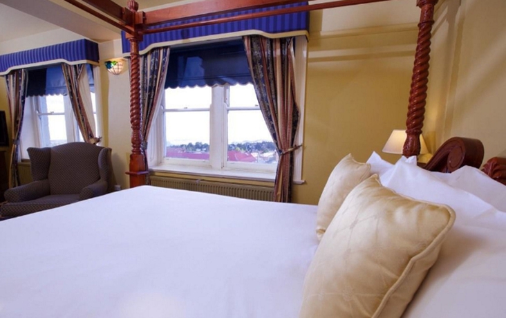 Imagen de la habitación del Hotel The Carrington. Foto 10