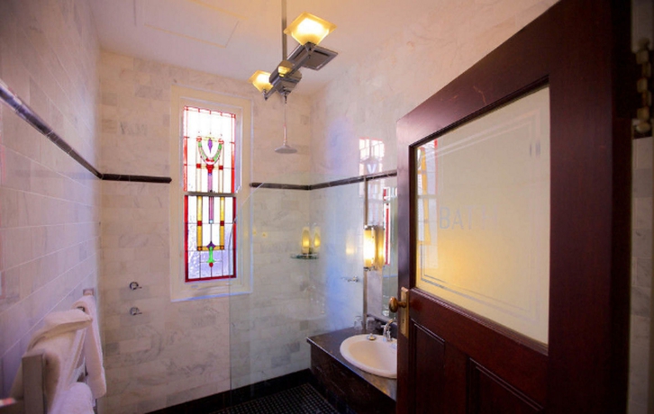 Imagen de la habitación del Hotel The Carrington. Foto 13