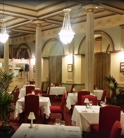 Imagen del bar/restaurante del Hotel The Carrington. Foto 3