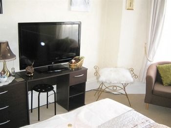 Imagen de la habitación del Hotel The Castleton. Foto 10