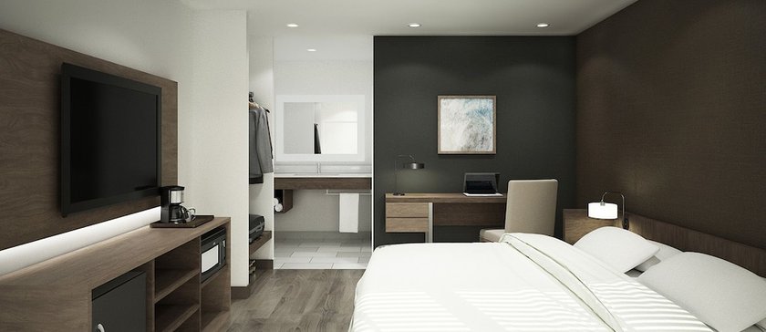 Imagen de la habitación del Hotel The Catrina. Foto 6