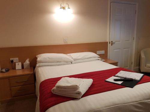Imagen de la habitación del Hotel The Cedars. Foto 4