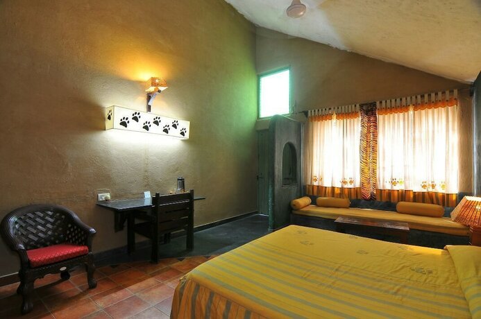Imagen de la habitación del Hotel The Celebration Van Vilas Kanha. Foto 14