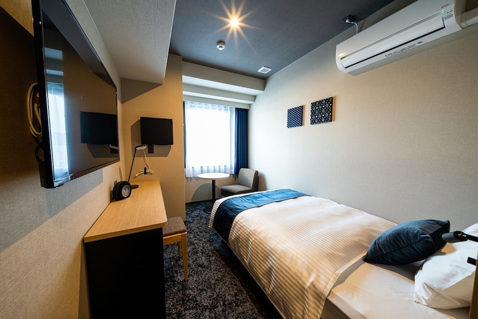 Imagen de la habitación del Hotel The Celecton Kurume. Foto 11