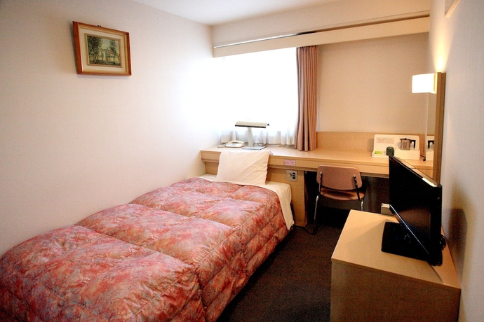 Imagen de la habitación del Hotel The Celecton Takamatsu. Foto 5