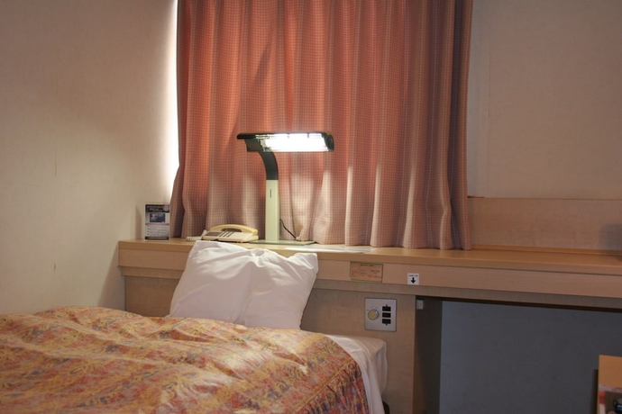 Imagen de la habitación del Hotel The Celecton Takamatsu. Foto 6