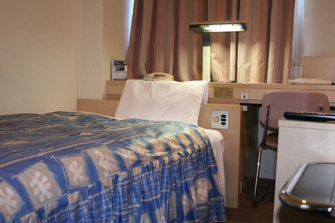 Imagen de la habitación del Hotel The Celecton Takamatsu. Foto 7