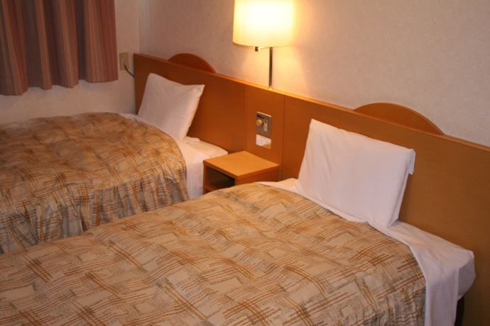 Imagen de la habitación del Hotel The Celecton Takamatsu. Foto 10